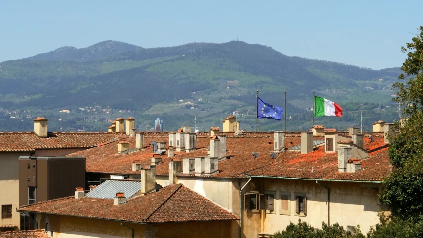 EU and Italian Flag Flying in Florence. High quality video