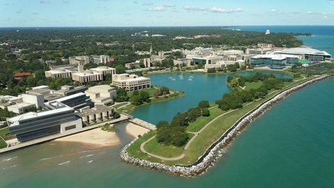 EVANSTON, IL – SEPTEMBER 9, 2021: Aerial view of Northwestern University and Lake Michigan with foreground beach and walking path.