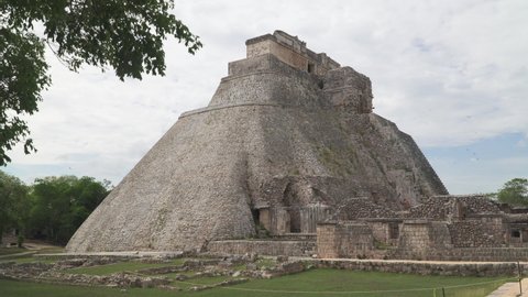 UXMAL, MEXICO - CIRCA 2021: Piramide del adivino also known as the Pyramid of the Magician, a central landmark of Uxmal, an ancient Mayan city in Yucatan peninsula