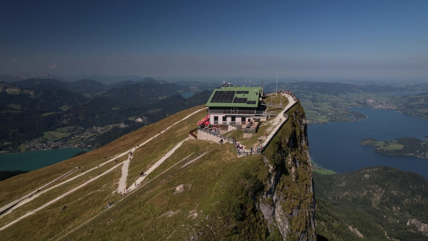 Fly away from Schafbergspitze Mountain at Wolfgangsee