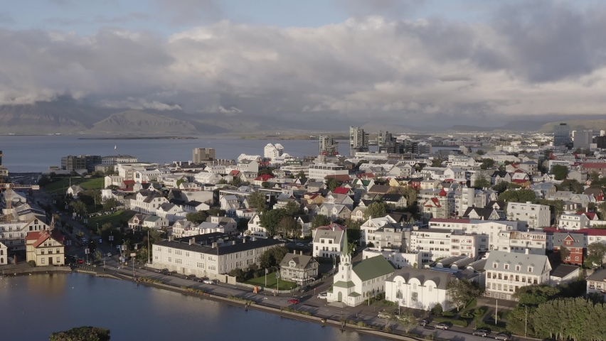 City skyline of Reykjavik in Iceland during sunset, golden hour, aerial