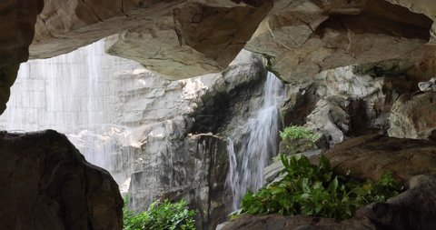 rock cave behind waterfall near Admiralty, Hong Kong Zoological and Botanical Gardens