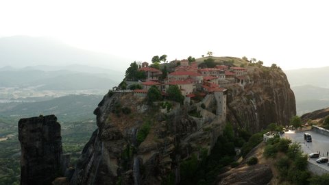 Largest Monastery On Rocky Outcrop - Holy Monastery Of Great Meteoron On Sunset In Meteora-Greece. - Aerial