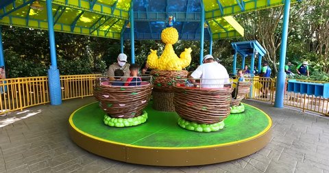
Orlando, Florida. August 25, 2021. People enjoying Big Bird's Twirl 'N' Whirl at Seaworld.