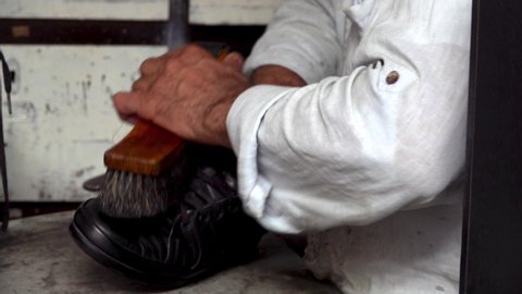 Shoeshine Shines Old Black Shoe Footage.