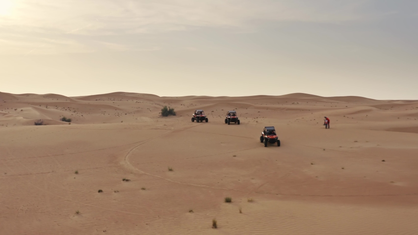 Dune buggies in UAE desert Royalty-Free Stock Footage #1079151455
