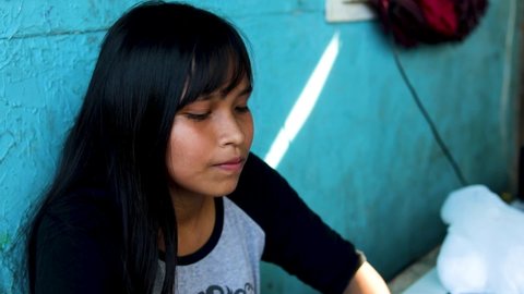Manaus , Amazonas , Brazil - 08 14 2020: Manaus, Brazil - August 2020: happy teenage girl in a remote village along the Amazon river