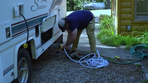 West Branch , United States - 10 18 2020: Working on Washing System of RV