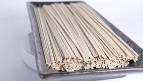 Dried Soba buckwheat noodles, close up video clip