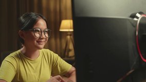 Asian Girl Student Distance Learning With Computer From Home
