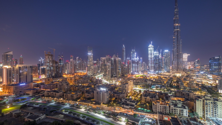 Dubai Downtown night to day timelapse with tallest skyscraper and other towers
