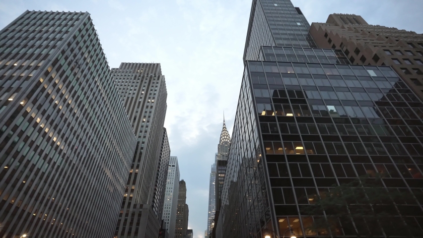 NEW YORK CITY, USA - SEPT 2, 2021: Establishing moving drone shot of skyscrapers buildings street in New York City Manhattan. 4k slow motion. Concept of American modern urban life, NYC   