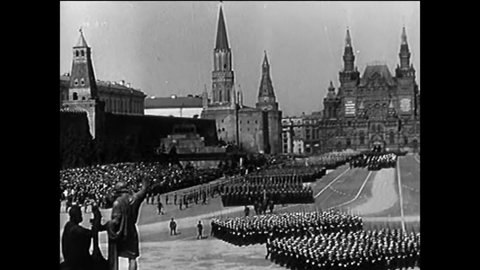 CIRCA 1945 - Russian soldiers march in Moscow. President Truman reads an announcement of the war's end, after Japan surrenders.