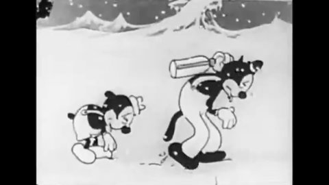 CIRCA 1930 - Waffles the Cat tries to give an exhausted Don Dog some water during a trek in the arctic but the water freezes.