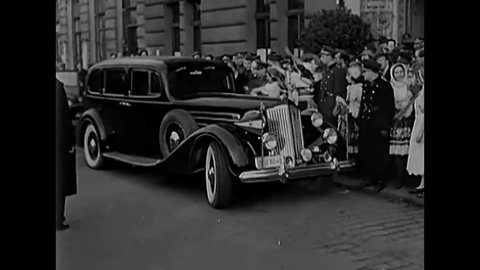 CIRCA 1940s - The motorcade of Yugoslovian Prime Minister Tito arrives at the Prague Castle in Prague, Czechoslovakia.