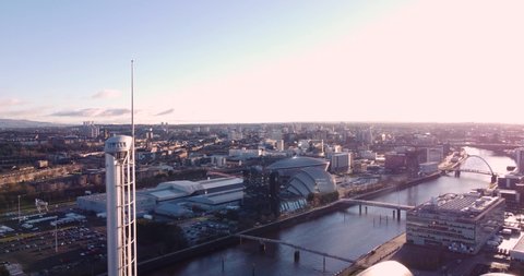 Glasgow, Scotland, UK June 2021. Aerial shots of Glasgow over river clyde at sunset featuring hydro and Glasgow Skyline.4k.  