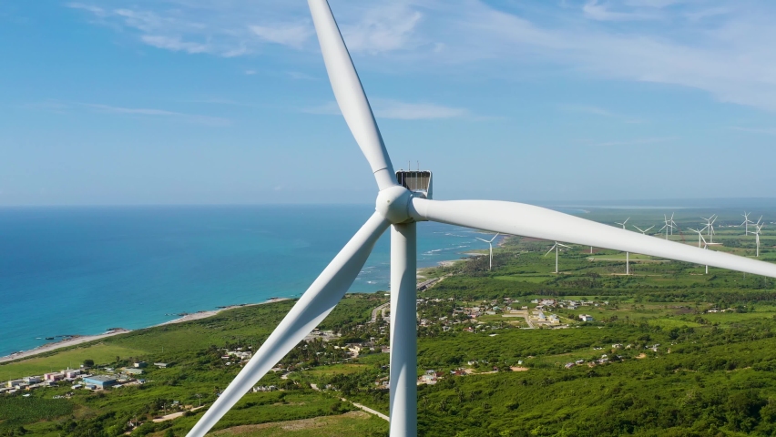 Large rotor wind electric generator. Modern renewable fuel technologies. Wind turbine windmill in the Dominican Republic on the Caribbean Sea. Royalty-Free Stock Footage #1079232428