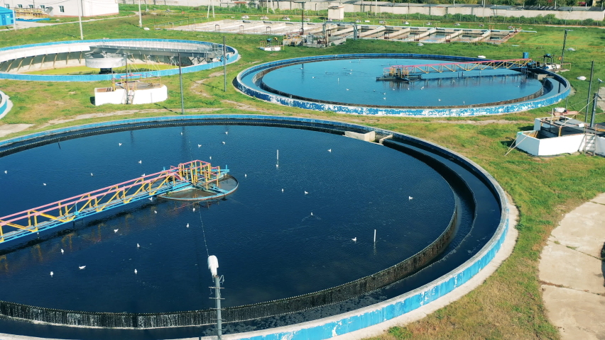 Round wastewater treatment facilities located outdoors Royalty-Free Stock Footage #1079239244