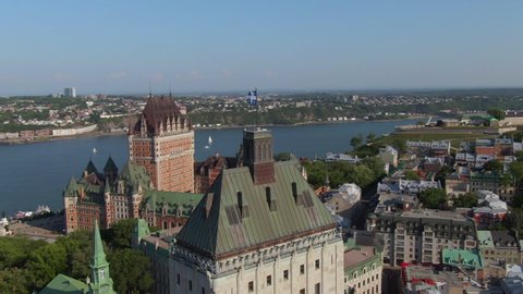 Aerial orbiting shot showing Quebec City during summer including historical landmark Frontenac castle in Quebec, Canada.