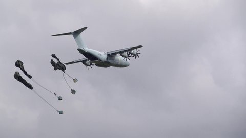 ZM401 RAF Royal Air Force Airbus A400M Atlas military cargo plane on a low-level cargo parachute drop run over Wiltshire UK