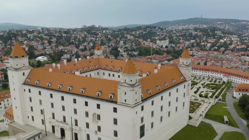 Orbiting Aerial Shot Above Bratislava Castle Reveals Cityscape in Background