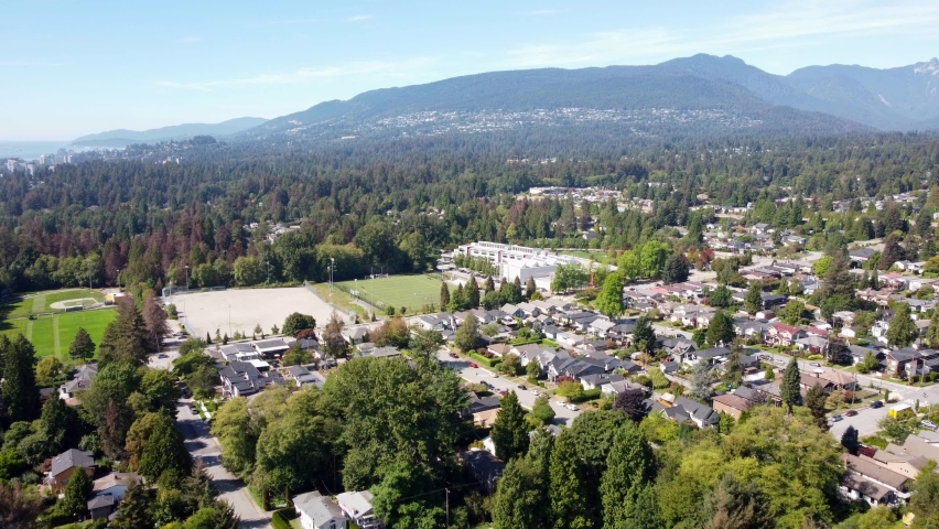Aerial video of North Vancouver, British Columbia residential area on a beautiful sunny day.