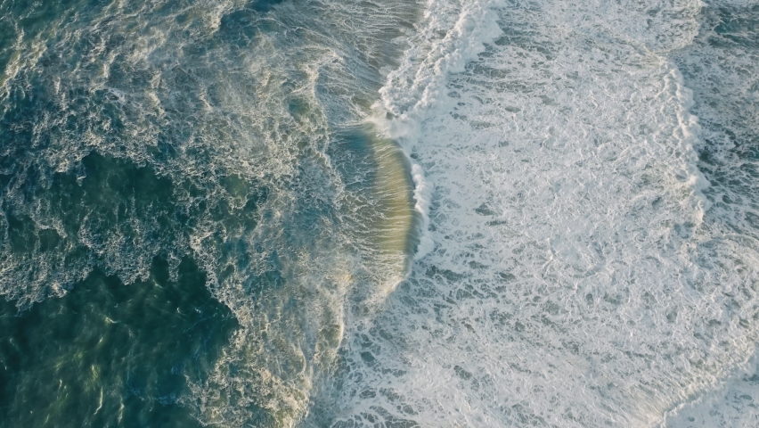 Aerial view of stormy bluish ocean with high tides. Wonderful natural beauty of the Atlantic Ocean. High quality 4k footage Royalty-Free Stock Footage #1079261294