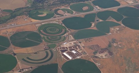 Aerial airplane a view in irrigation circled fields a desert near Pearce, Arizona, USA
