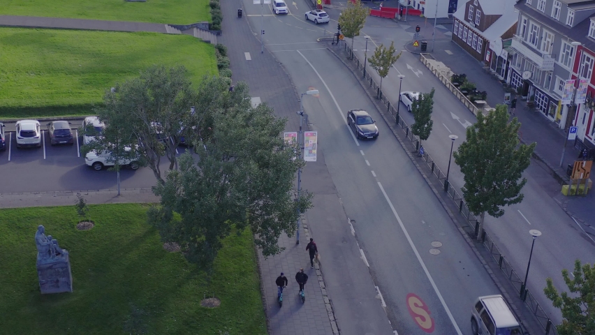 Aerial at calm Lækjargata street in district Midborg during sunset, Reykjavik