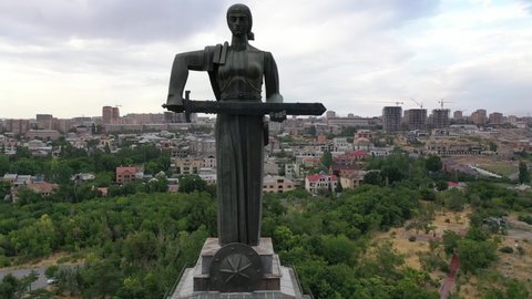 Yerevan, Armenia 06.28.2021 Mother Armenia Monument  aerial close view. A statue of a woman holding a sword․ Mother Armenia Statue or Mayr Hayastan located in Victory Park, Yerevan. 