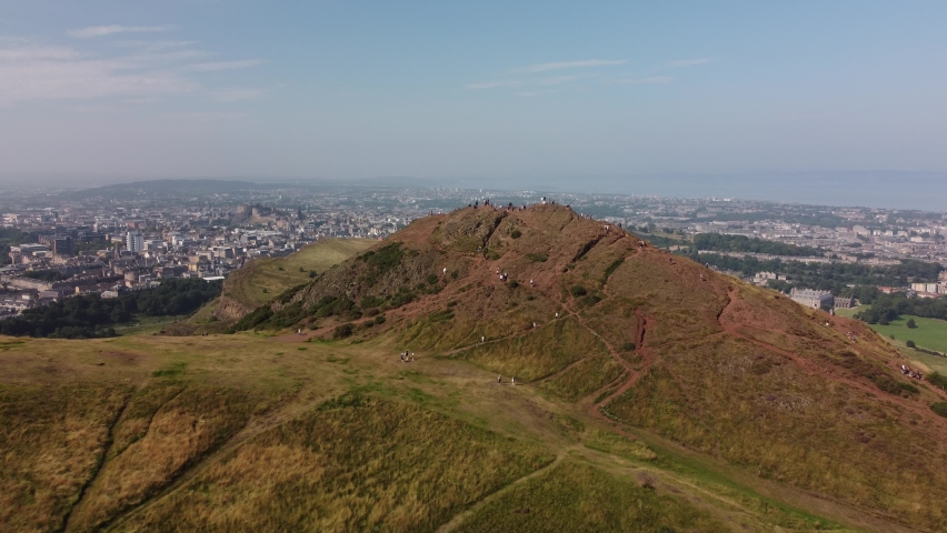4K Aerial View of Edinburgh City Skyline taken by Drone from Arthur