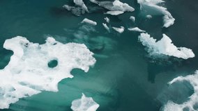 Flying Over Small Icebergs. High quality video