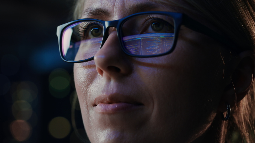 Close-up Portrait of Female Software Engineer Working on Computer, Programming Reflecting in Glasses. Developer Working on Innovative e-Commerce Application using Machine Learning, AI, Big Data Royalty-Free Stock Footage #1079290691