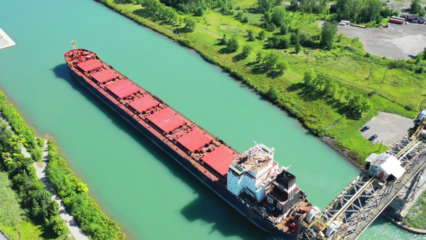 Aerial scene of a Lake Freighter travelling in the Welland Canal, Canada 4K