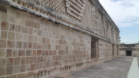 UXMAL, MEXICO - MAY 2021: Ruins of the Quadrangle of the Nuns building, an important landmark of ancient Mayan city of Uxmal, Yucatan