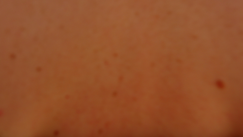 Young tourist walking along the city street.