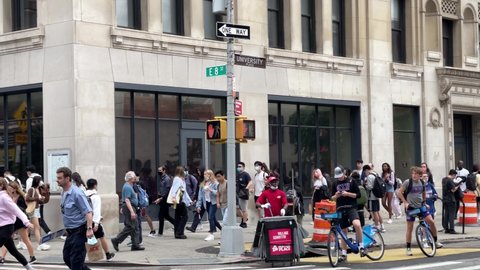 NYC, USA - SEPT 16, 2021: crowded street NYU students waiting on line to enter Cantor Film Center New York City.