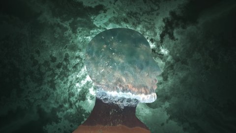 Silhouette of a human head with ocean waves effect
