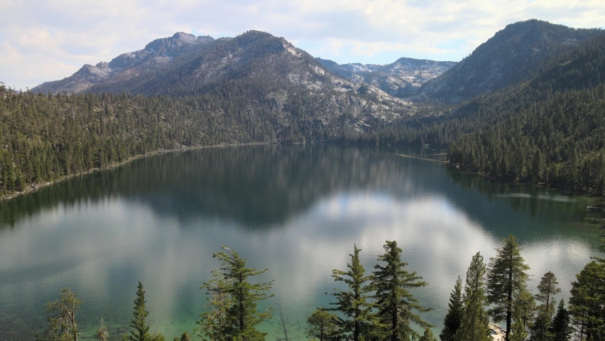 Drone flying over the waters of Cascade Lake in Tahoe California.