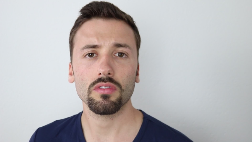 Surprised caucasian man with shocked expression 