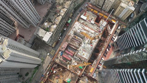 Construction Site And Highrise Buildings In Taikoo Shing, Hong Kong. aerial top-down