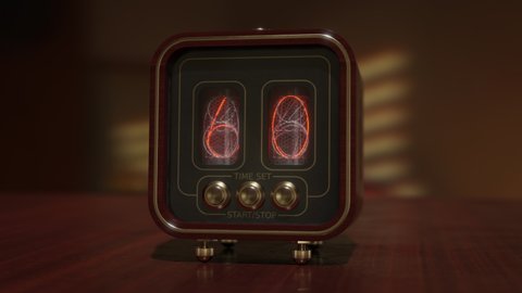 A vintage steampunk timer with numbers on the display tubes counts down from 60 to 0 seconds. Wood, brass, radio tubes. One minute Timer on Nixie tubes.
