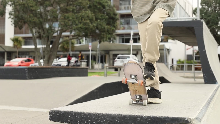 Teenager boy in a skate park, outdoor portrait. adolesence concept, teen culture. 