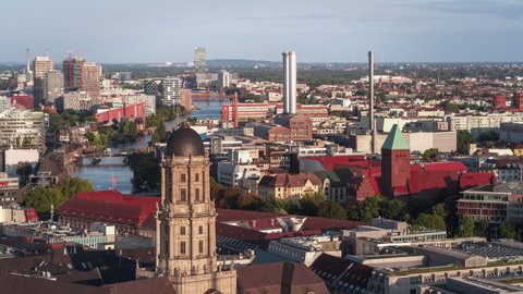 Establishing Aerial View Shot of Berlin, Germany, Spree River, East Berlin, warm light, Oberbaum Bridge