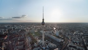 Establishing Aerial View Shot of Berlin, Germany, Alexanderplatz, Mitte, warm sunny day, slow track left