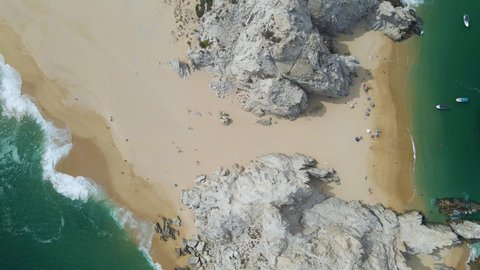 Aerial: top down shot of beautiful Cabo San Lucas loversbeach in Mexico