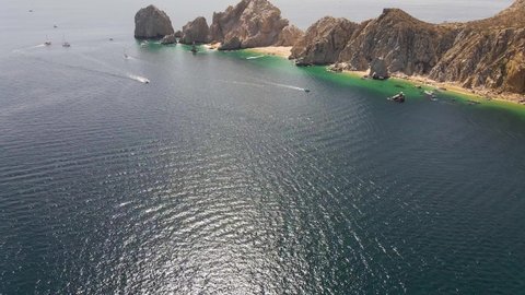 Aerial: Baja California Sur peninsula, view of Arch of Cabo San Lucas, Mexico