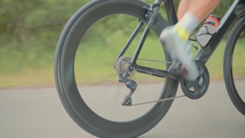 Cyclist On Bike Cycling And Pedaling Sport Recreation.Gear System Bicycle And Bike Wheel Rotation.Fitness Cyclist Twists Pedals Riding Triathlon Road Bike.Cycling Gear Athlete Workout.Sport Recreation Royalty-Free Stock Footage #1079452814