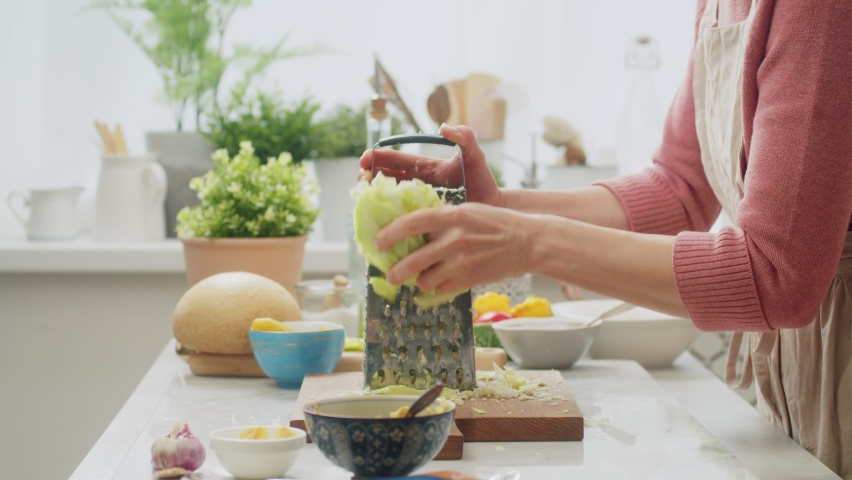 Chef cook making cabbage salad
