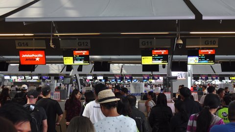 BANGKOK, THAILAND - JUL 31, 2019. People at Suvarnabhumi Airport Bangkok, Thailand. Suvarnabhumi Airport is one of two international airports serving Bangkok.
